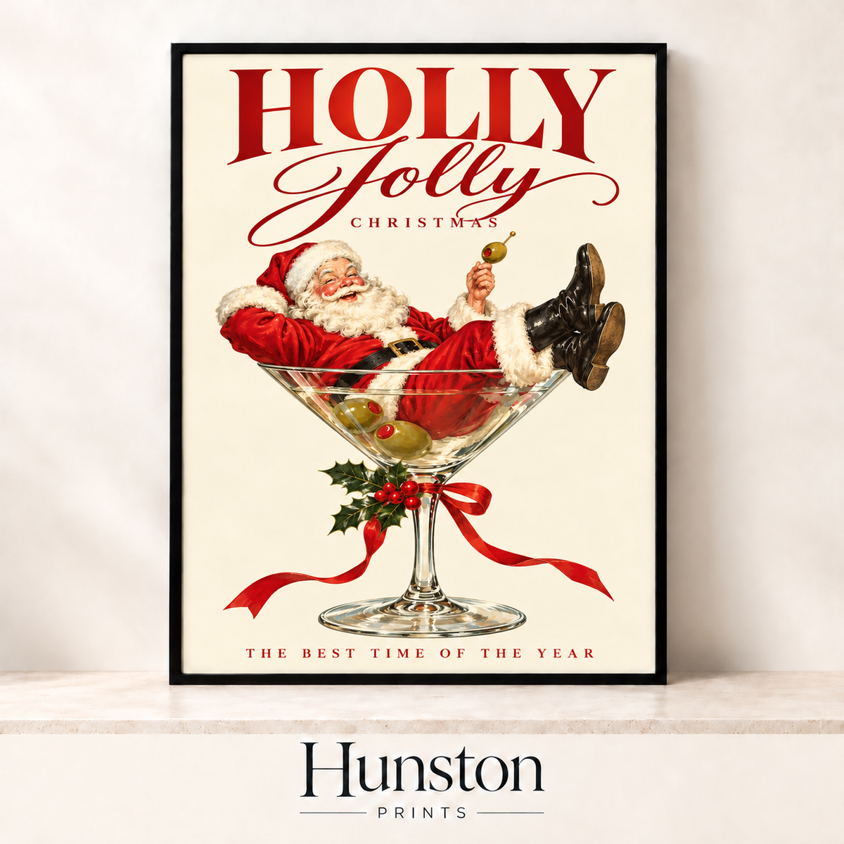 Retro Santa Claus lounging in a martini glass with olives under Holly Jolly Christmas lettering