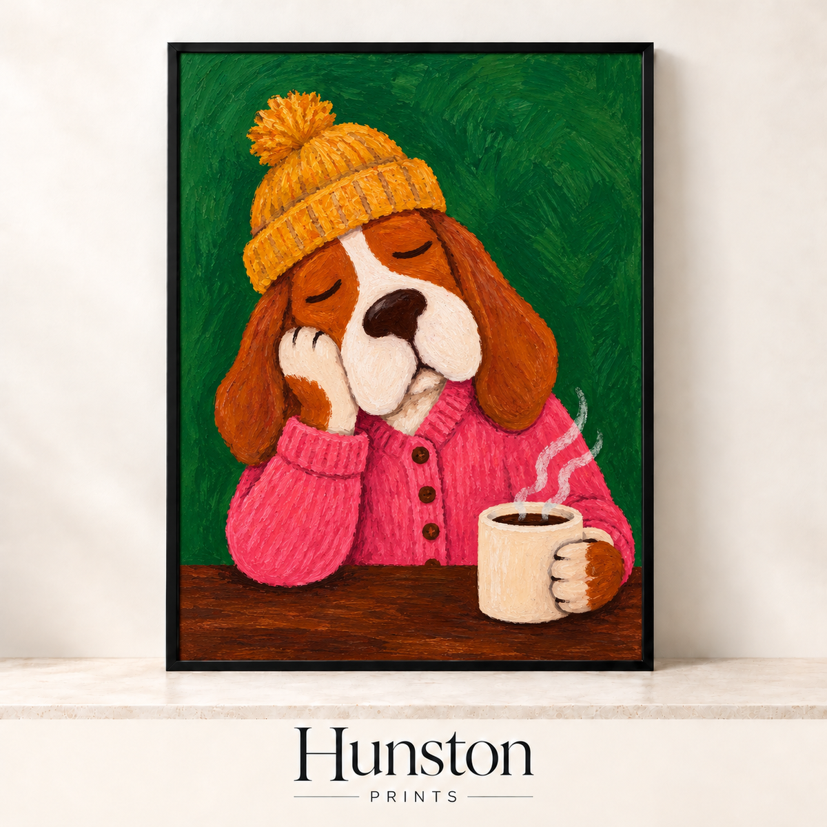 Sleepy beagle in a mustard bobble hat and pink cardigan holding a mug of coffee