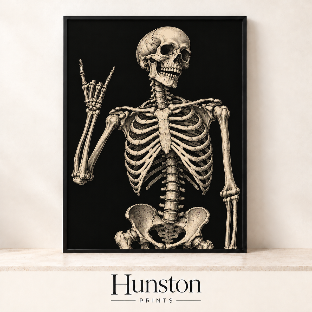 Vintage anatomical skeleton making the rock on hand sign on black