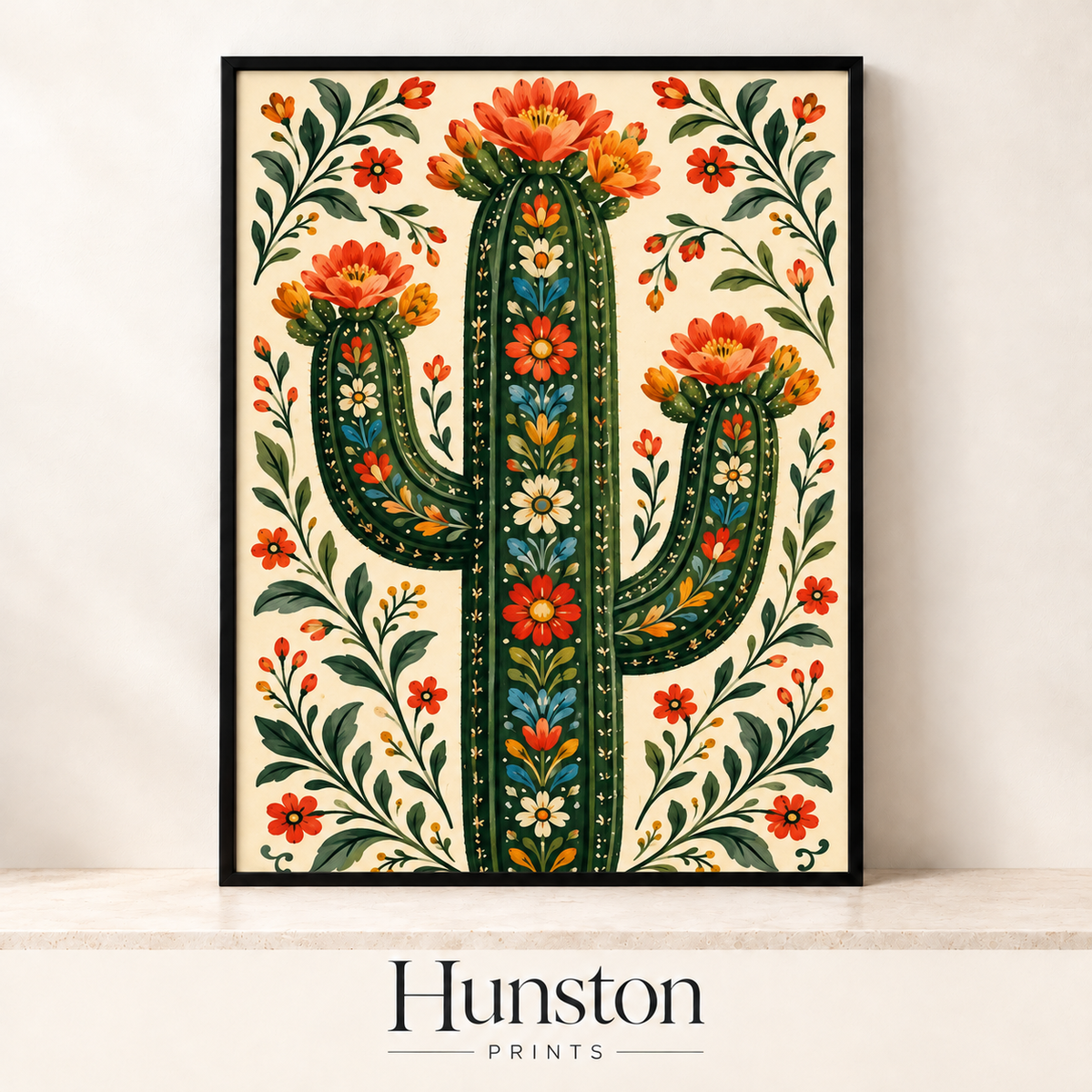 Green saguaro cactus decorated with folk flowers and topped with coral blooms