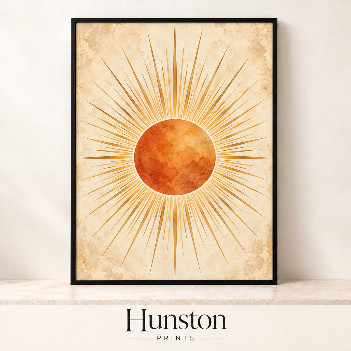 Burnt orange watercolour sun with golden rays on vintage parchment
