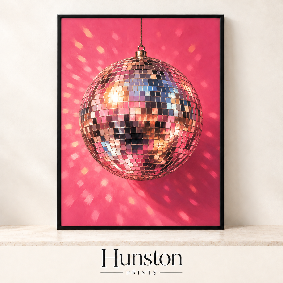 Sparkling rose gold and pink disco ball on a hot pink background