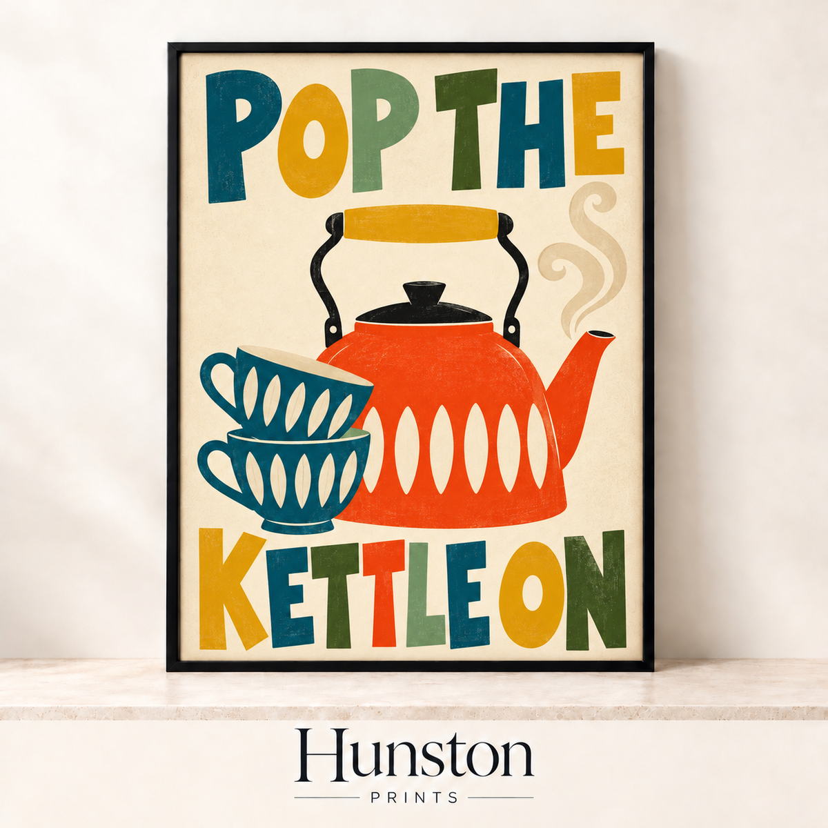 Retro orange kettle and blue teacups with colourful Pop the Kettle On lettering