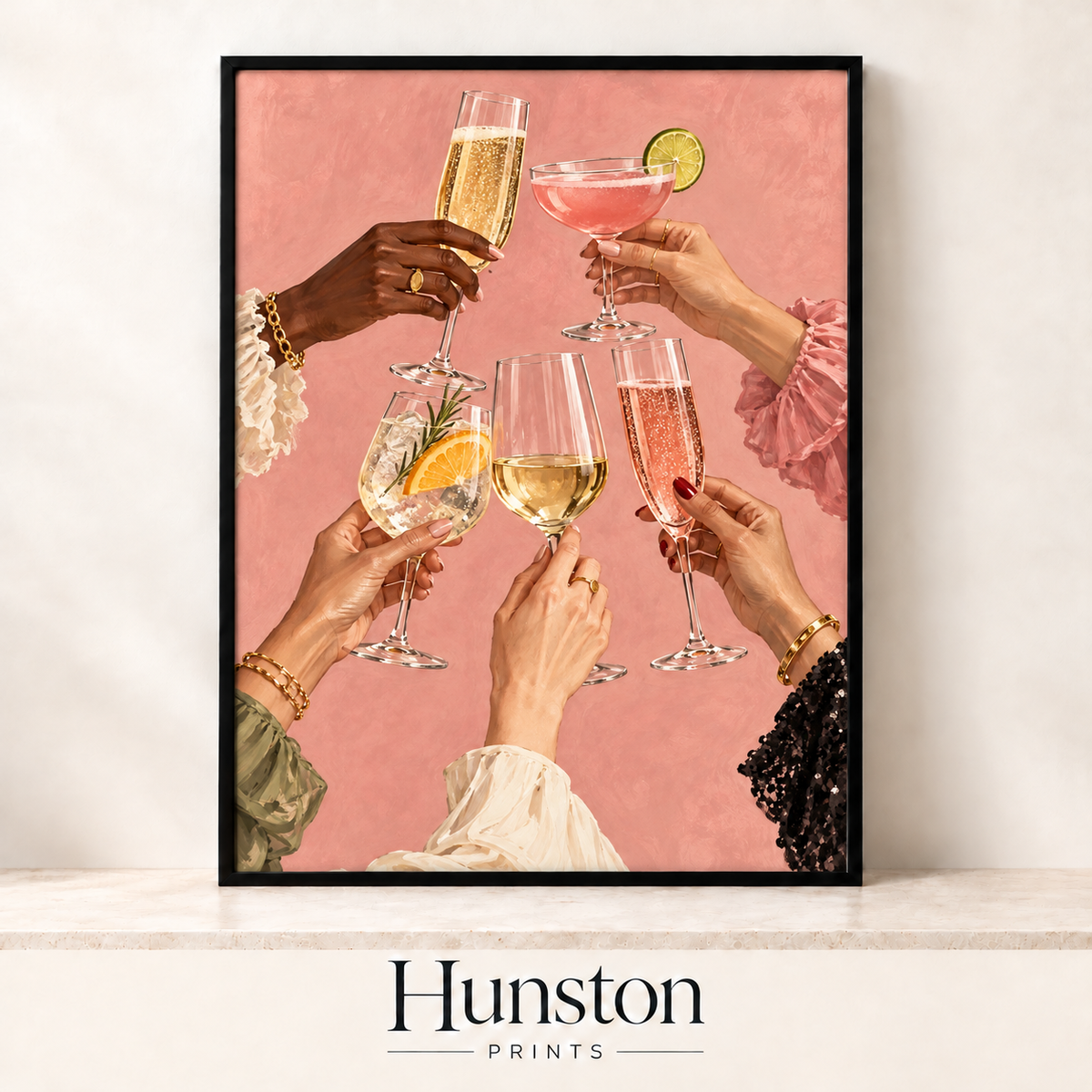 Five hands raising champagne flutes, cocktails and wine glasses in a toast on a pink background