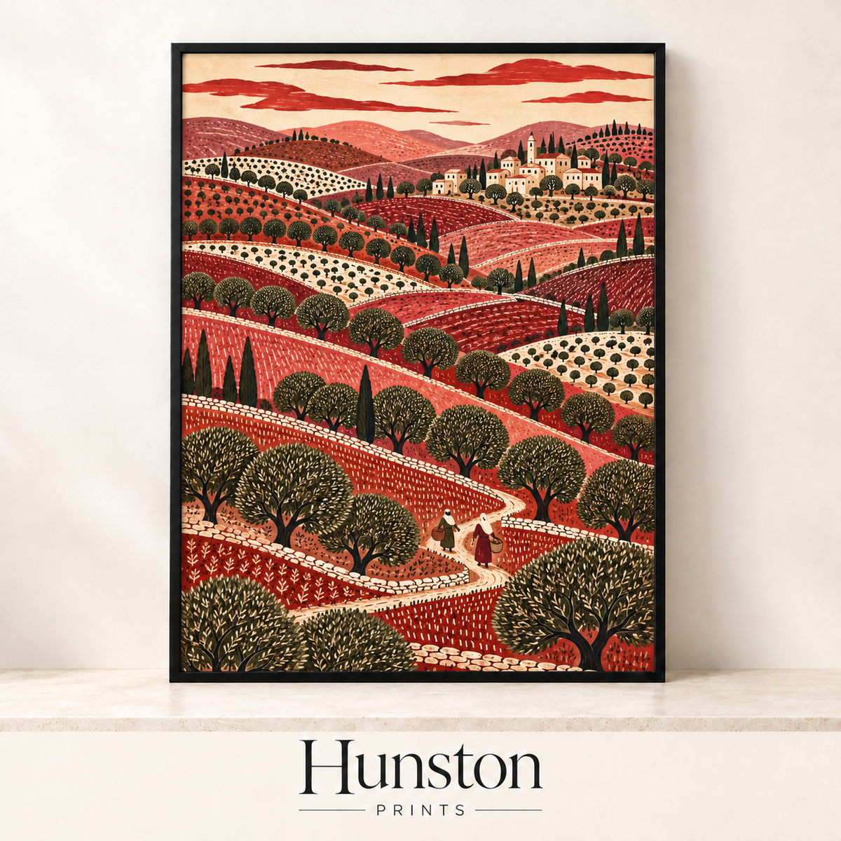 Rolling red and pink hills with olive trees, cypresses and a hilltop village