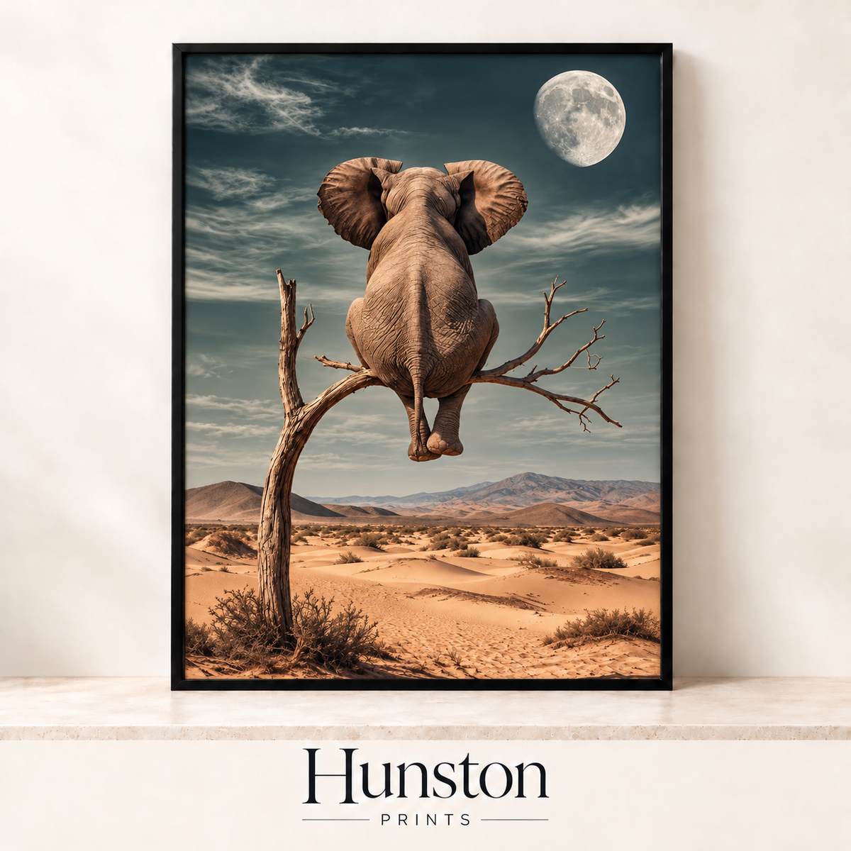 Elephant sitting on a thin tree branch looking over desert dunes at the moon