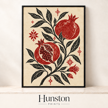 Red pomegranates and black leaves in a block print style with red cross-stitch motifs