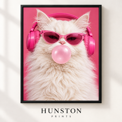 Fluffy white cat wearing pink cat-eye sunglasses and headphones blowing a pink bubblegum bubble