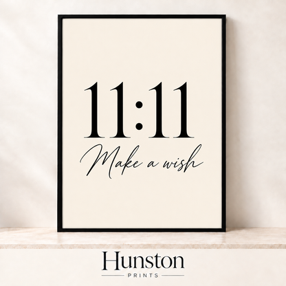 Black serif 11:11 with Make a wish in script on cream background