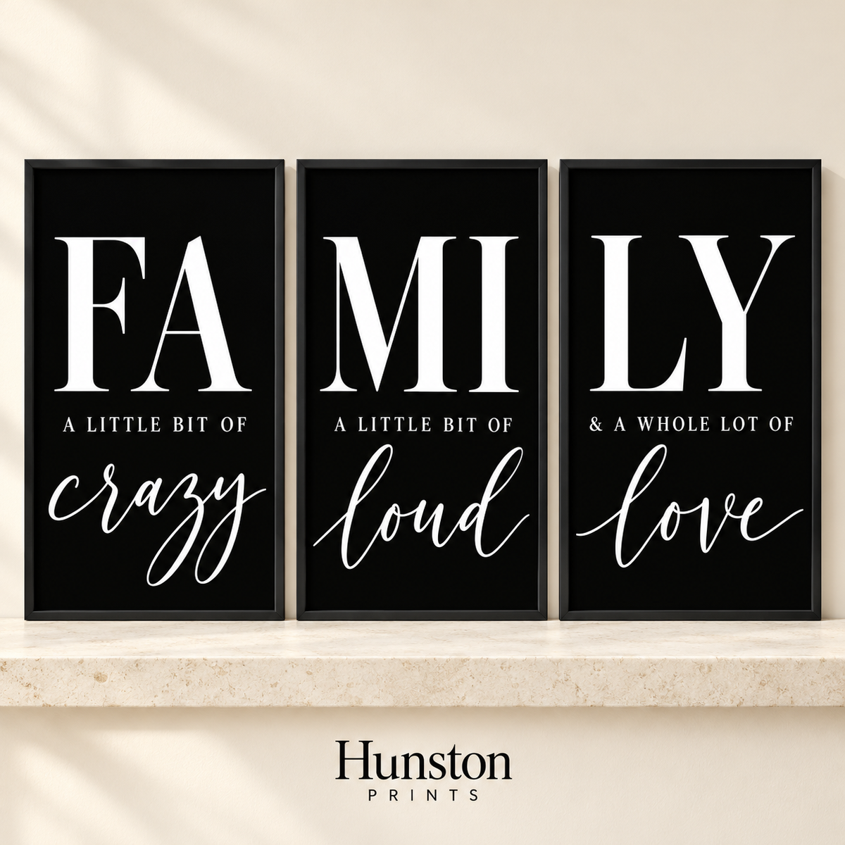 Set of three black prints spelling FAMILY with crazy, loud and love in script