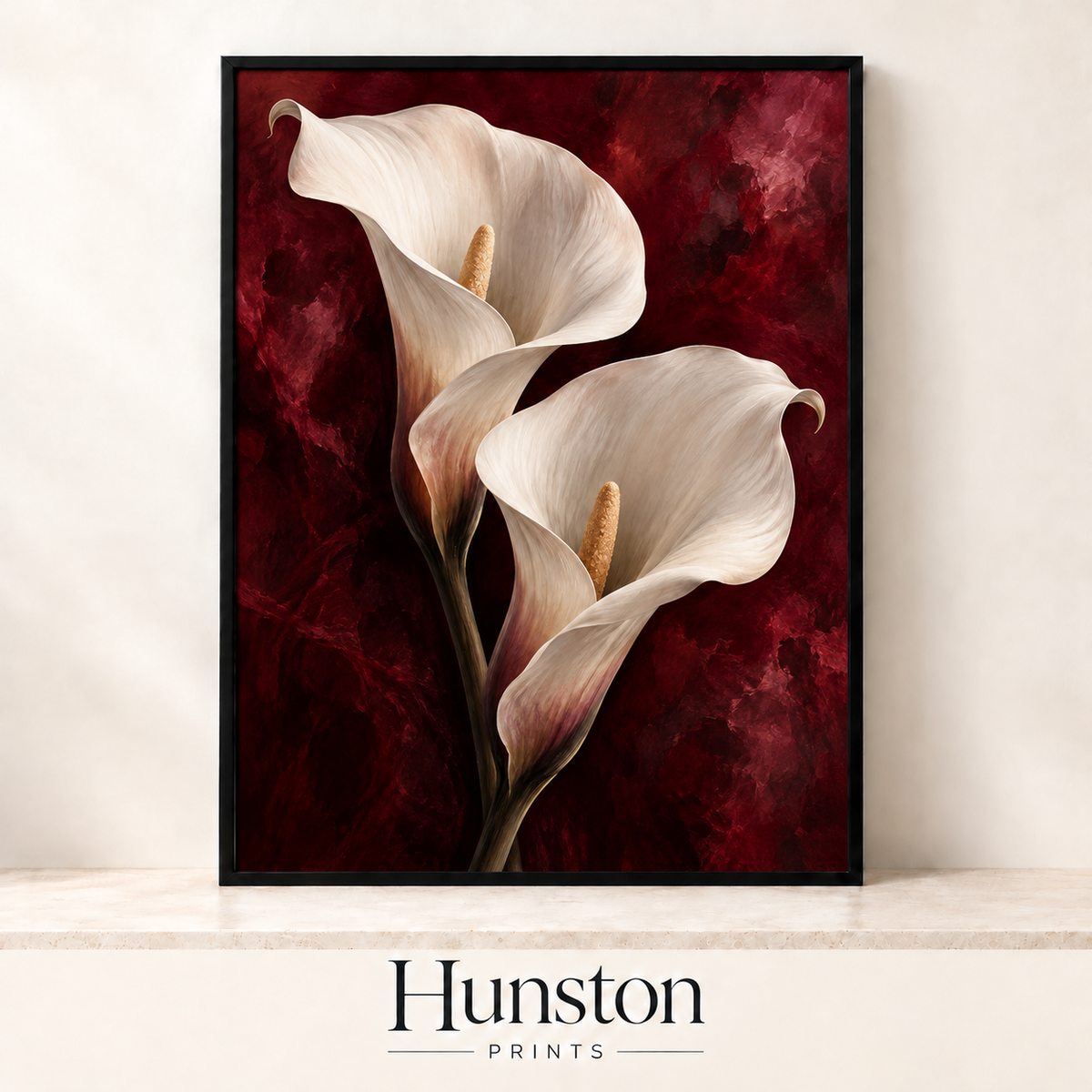 Two white calla lilies on a marbled burgundy background