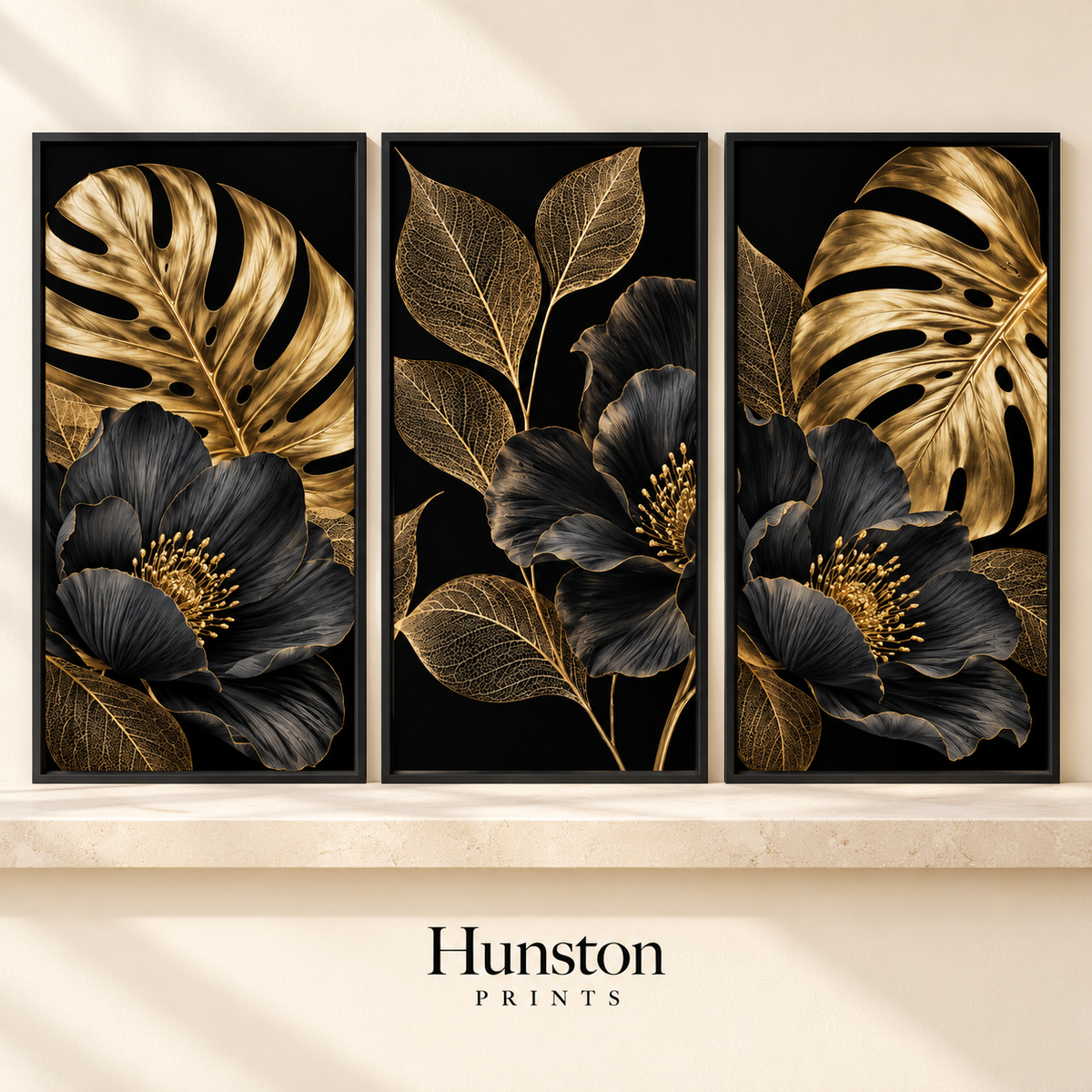 Set of three prints with gold monstera leaves and black flowers