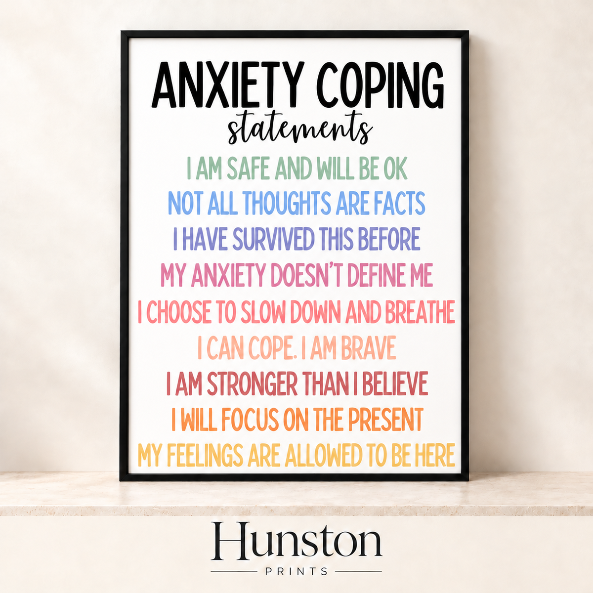 Anxiety coping statements in soft rainbow lettering on white