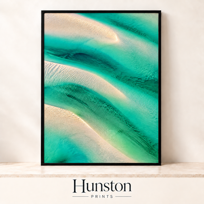 Aerial view of white sandbanks curving through turquoise water