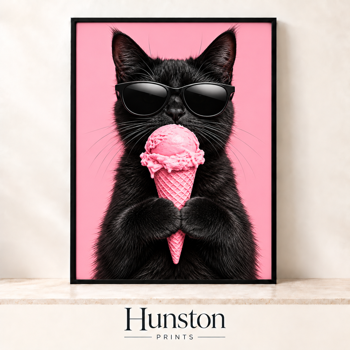 Black cat in sunglasses holding a pink ice cream cone on pink