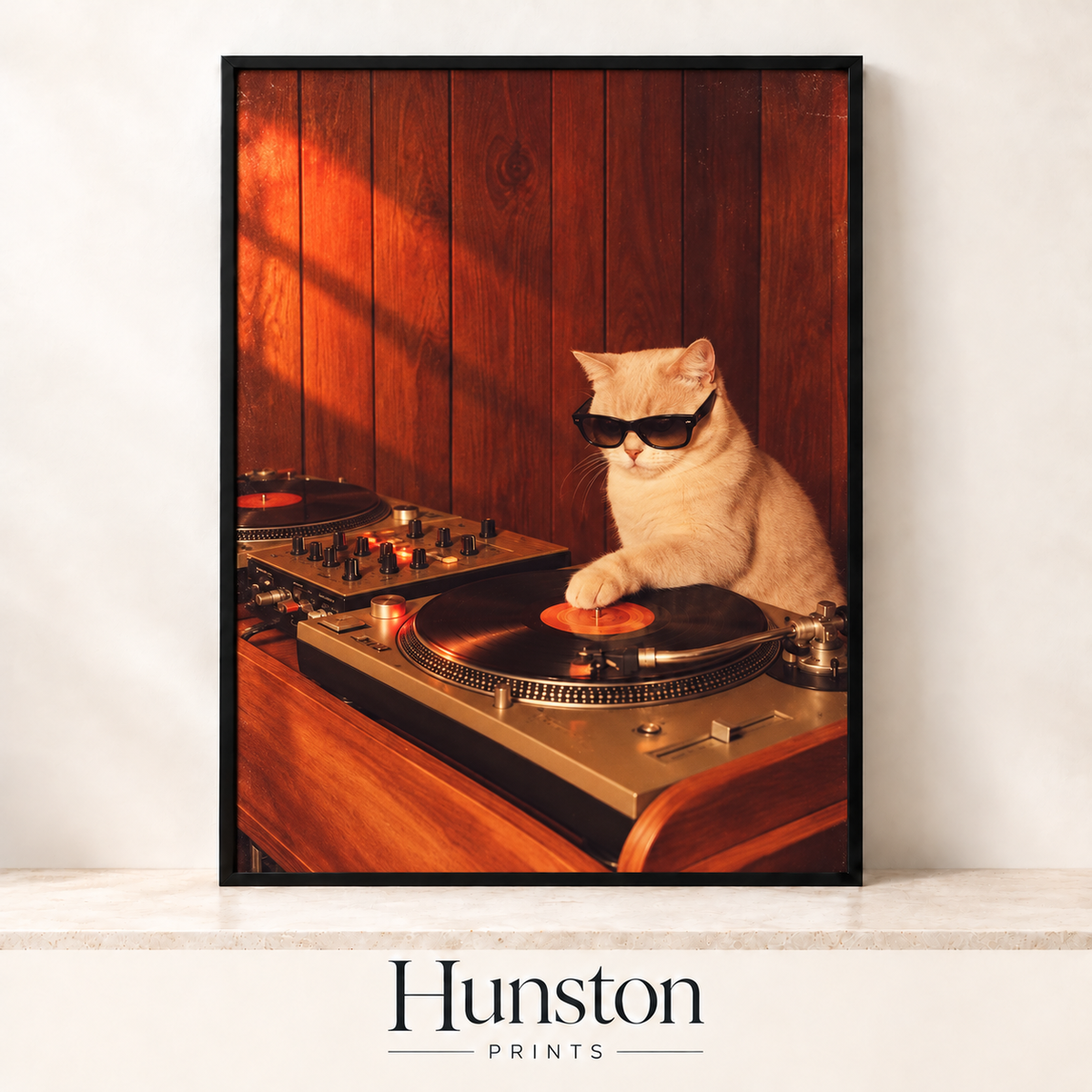 Cream cat in black sunglasses DJing on a vintage turntable