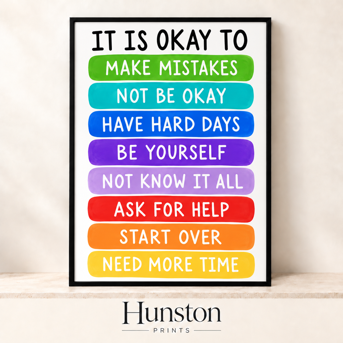 It Is Okay To poster with eight reminders on rainbow brushstroke bands