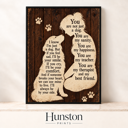 Silhouettes of a woman and a dog filled with text on dark wood