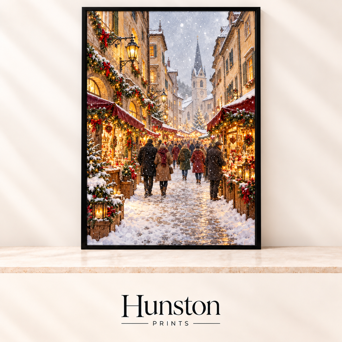 Snowy cobbled street lined with glowing Christmas market stalls and a church spire